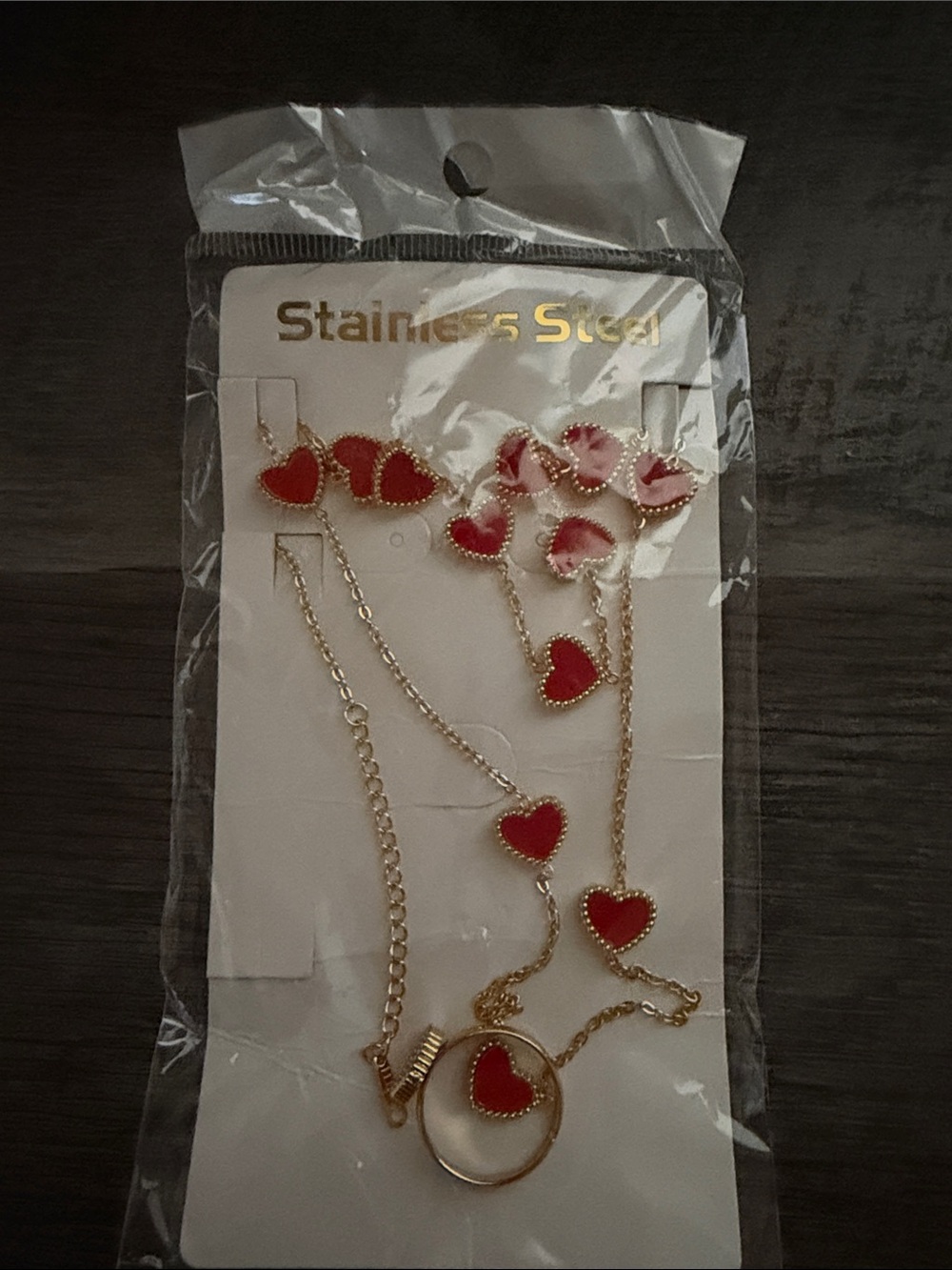 Gold Stainless Steel Necklace and Earring Set with Red Heart Accents